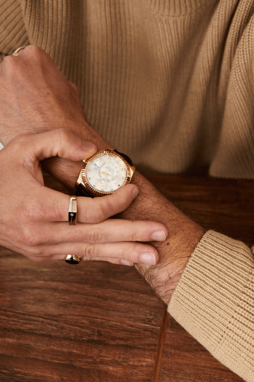 man with used watch