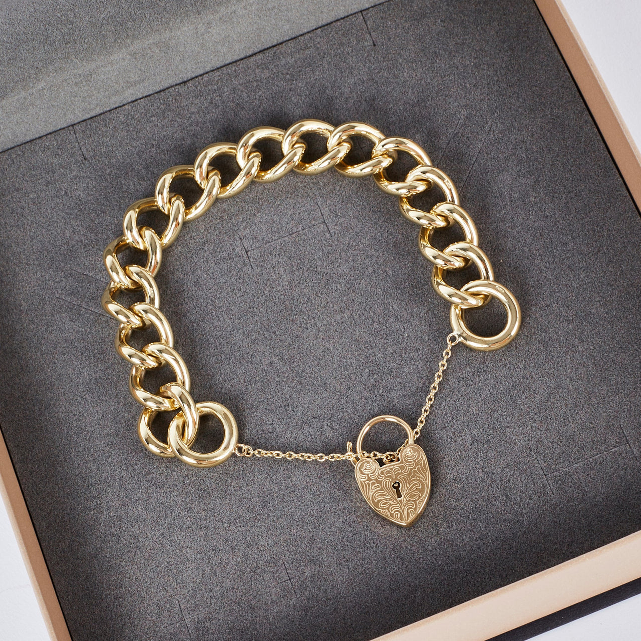 Pre-Owned 9ct Gold Curb Bracelet With Heart Padlock