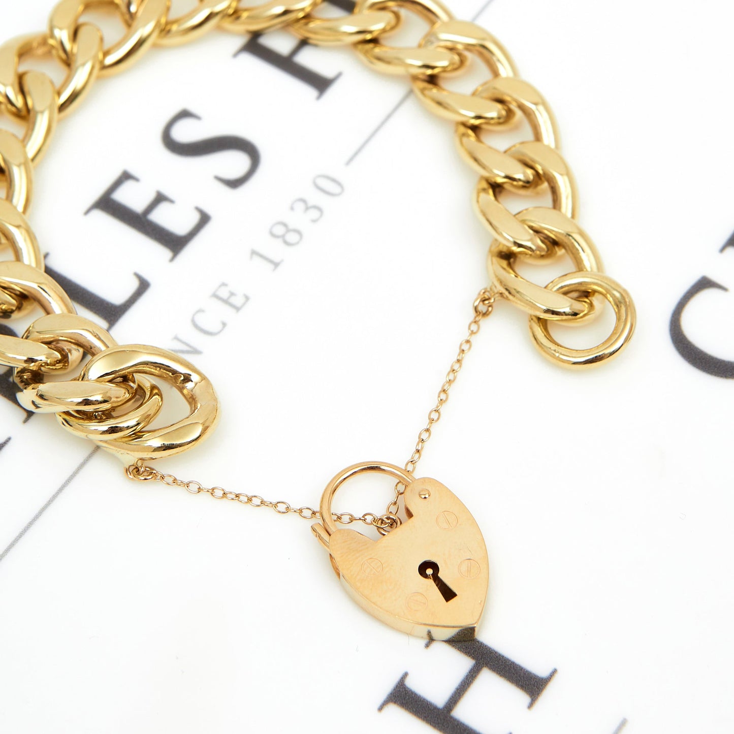 Pre-Owned 9ct Gold Curb Chain Bracelet With Heart Padlock