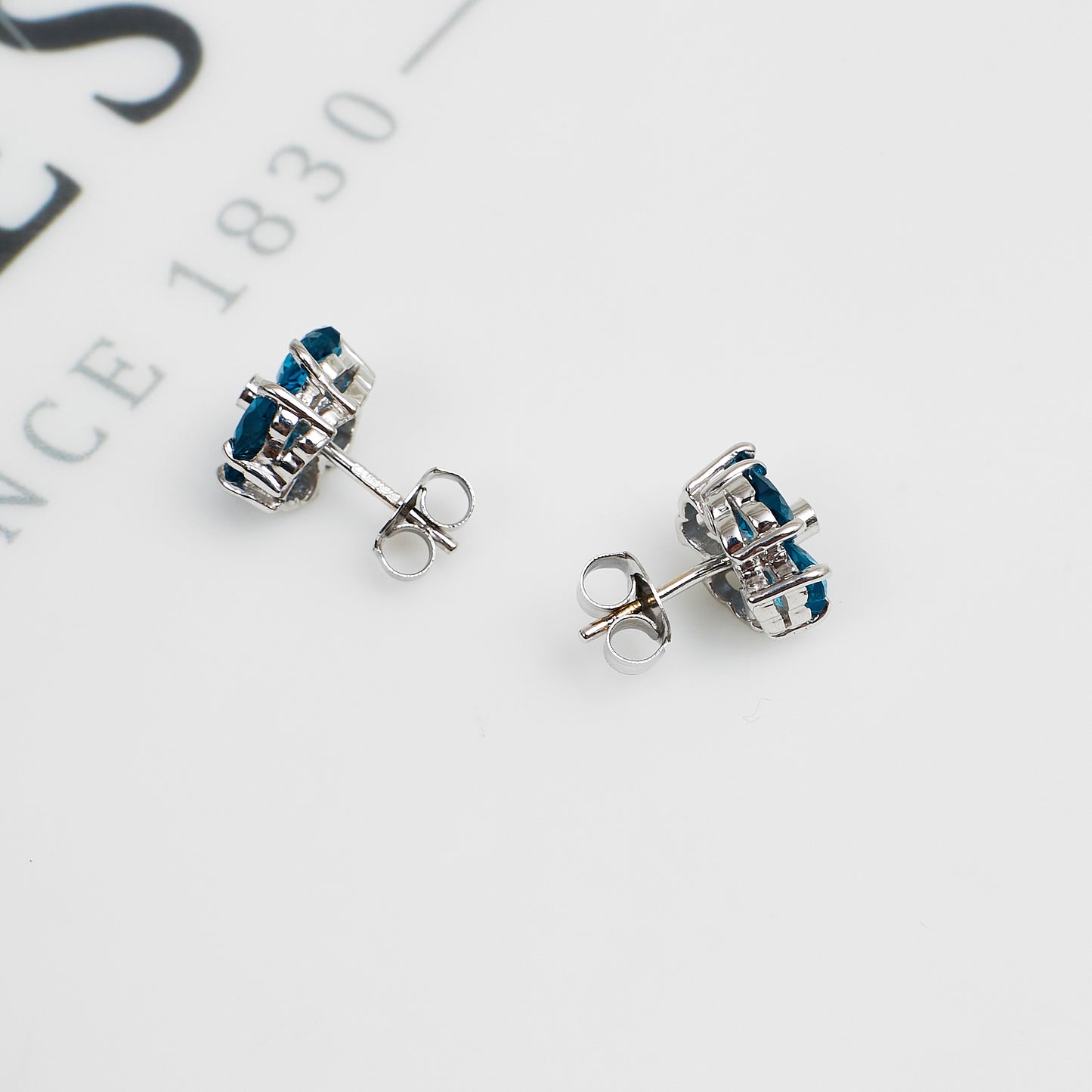 Pre-Owned 9ct White Gold Blue Topaz & Diamond Flower Earrings