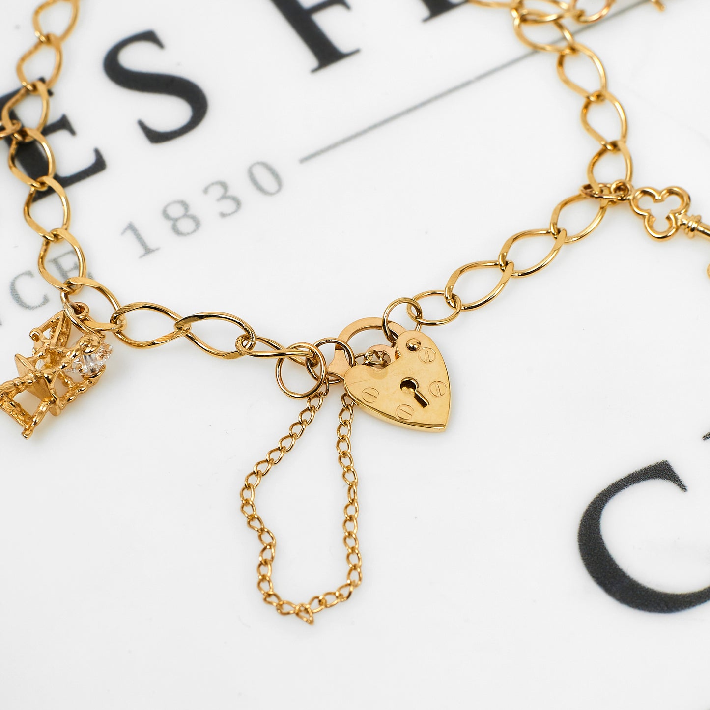 Pre-Owned 9ct Gold Charm Bracelet & Heart Padlock
