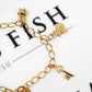 Pre-Owned 9ct Gold Charm Bracelet & Heart Padlock