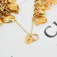 Pre-Owned 9ct Gold 31 Charm Bracelet & Heart Padlock 7 Inch