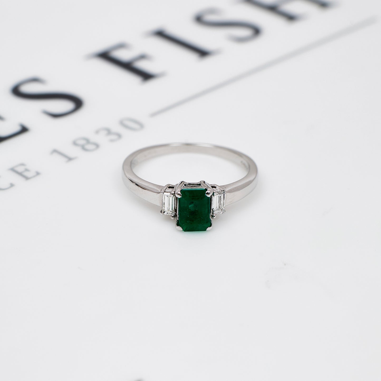 Pre-Owned 18ct White Gold Emerald & Baguette Diamond Ring