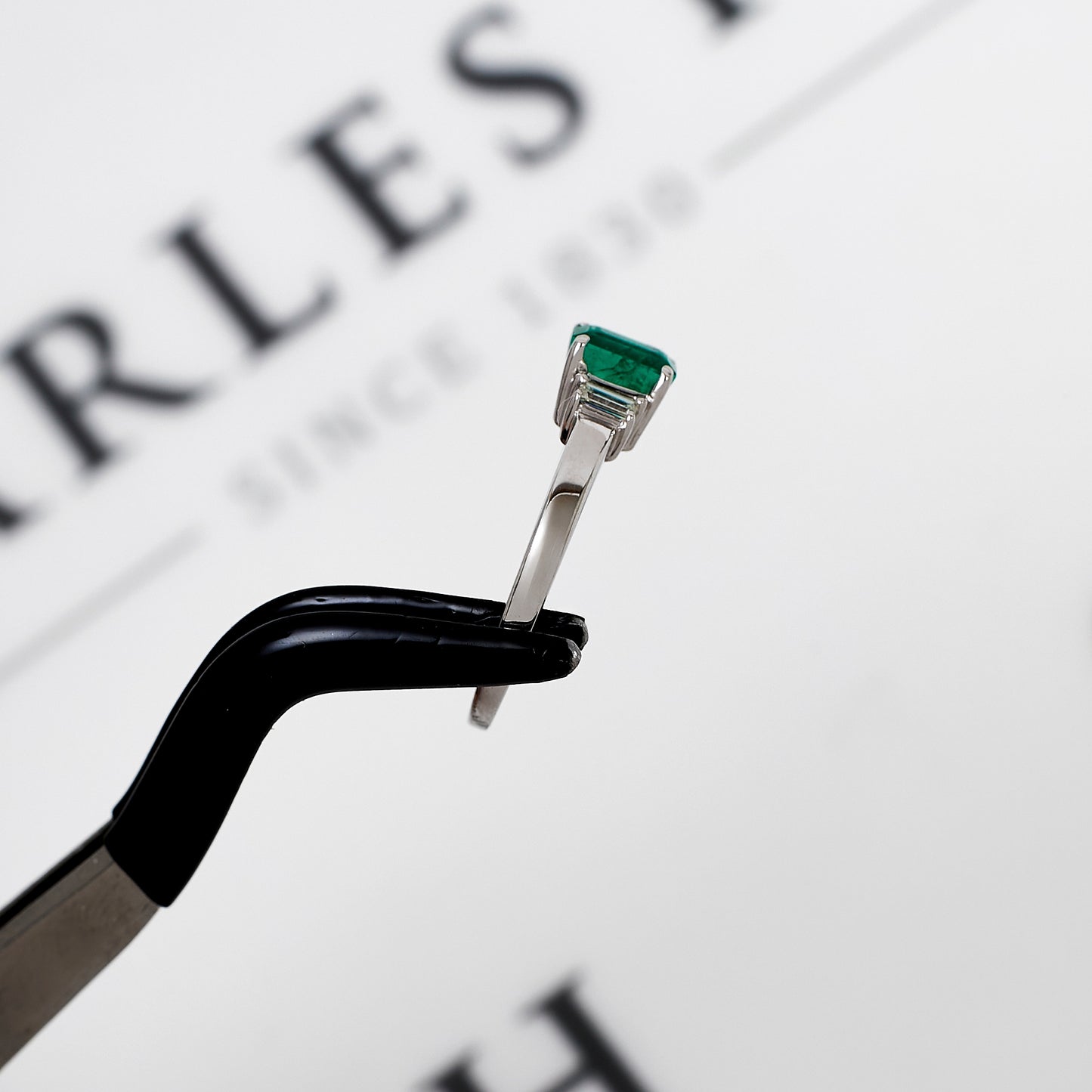 Pre-Owned 18ct White Gold Emerald & Baguette Diamond Ring