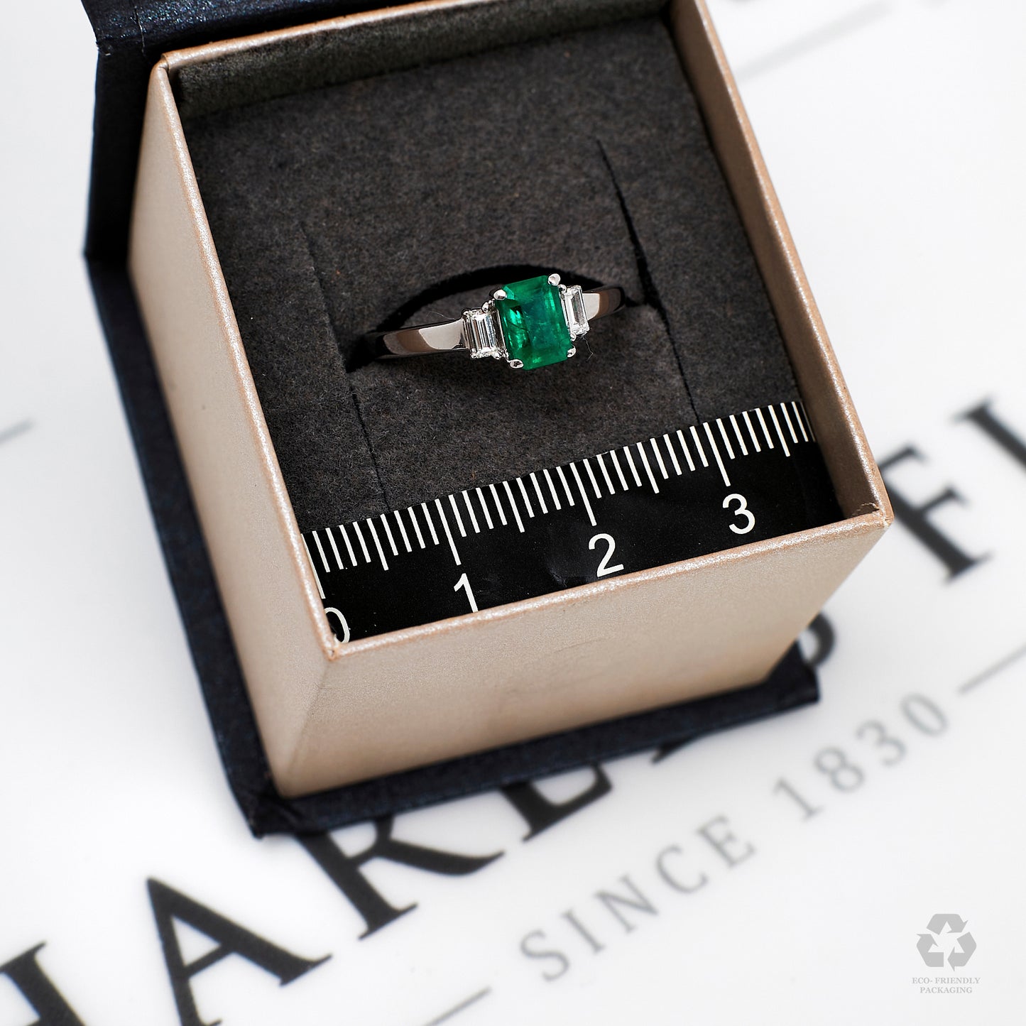 Pre-Owned 18ct White Gold Emerald & Baguette Diamond Ring