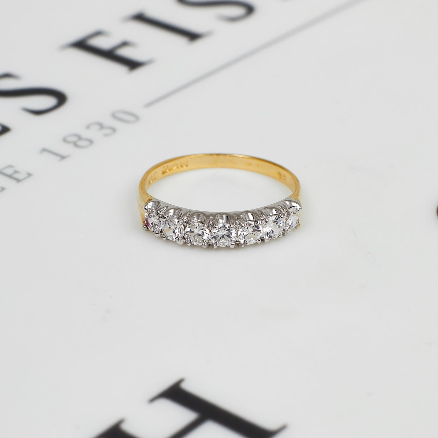 Pre-Owned 9ct Gold 7 CZ Set Ring Size P.5