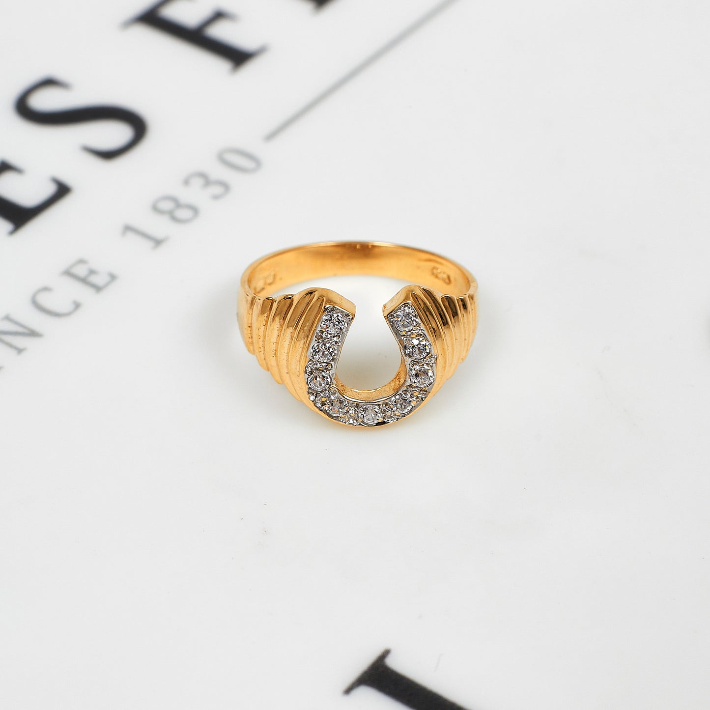 Pre-Owned 9ct Gold CZ Horseshoe Ring Size O.5