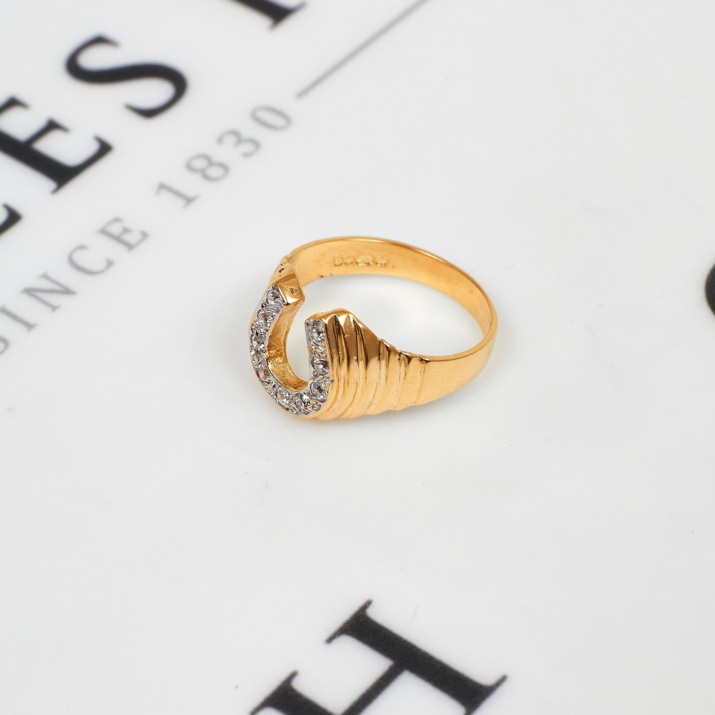 Pre-Owned 9ct Gold CZ Horseshoe Ring Size O.5