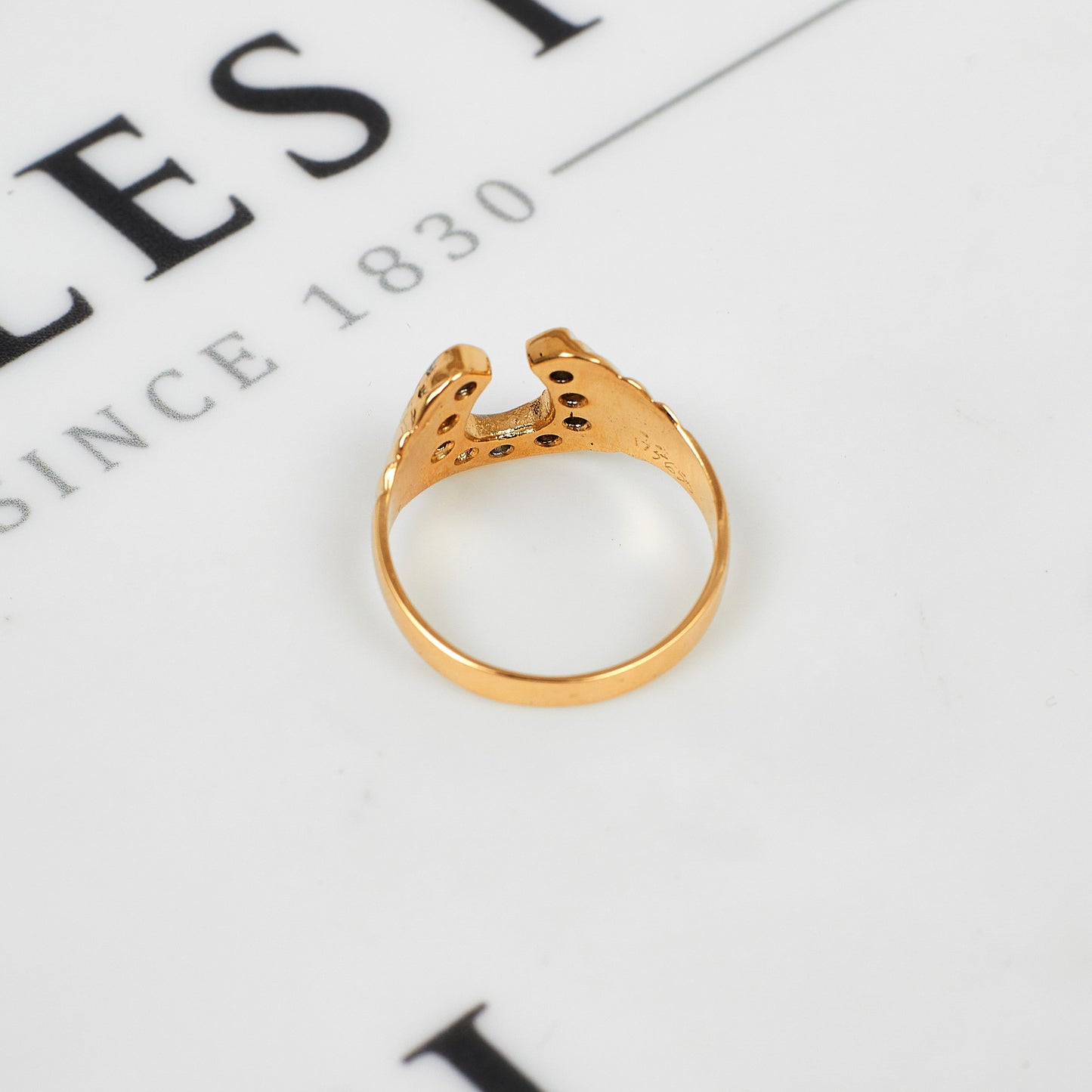 Pre-Owned 9ct Gold CZ Horseshoe Ring Size O.5