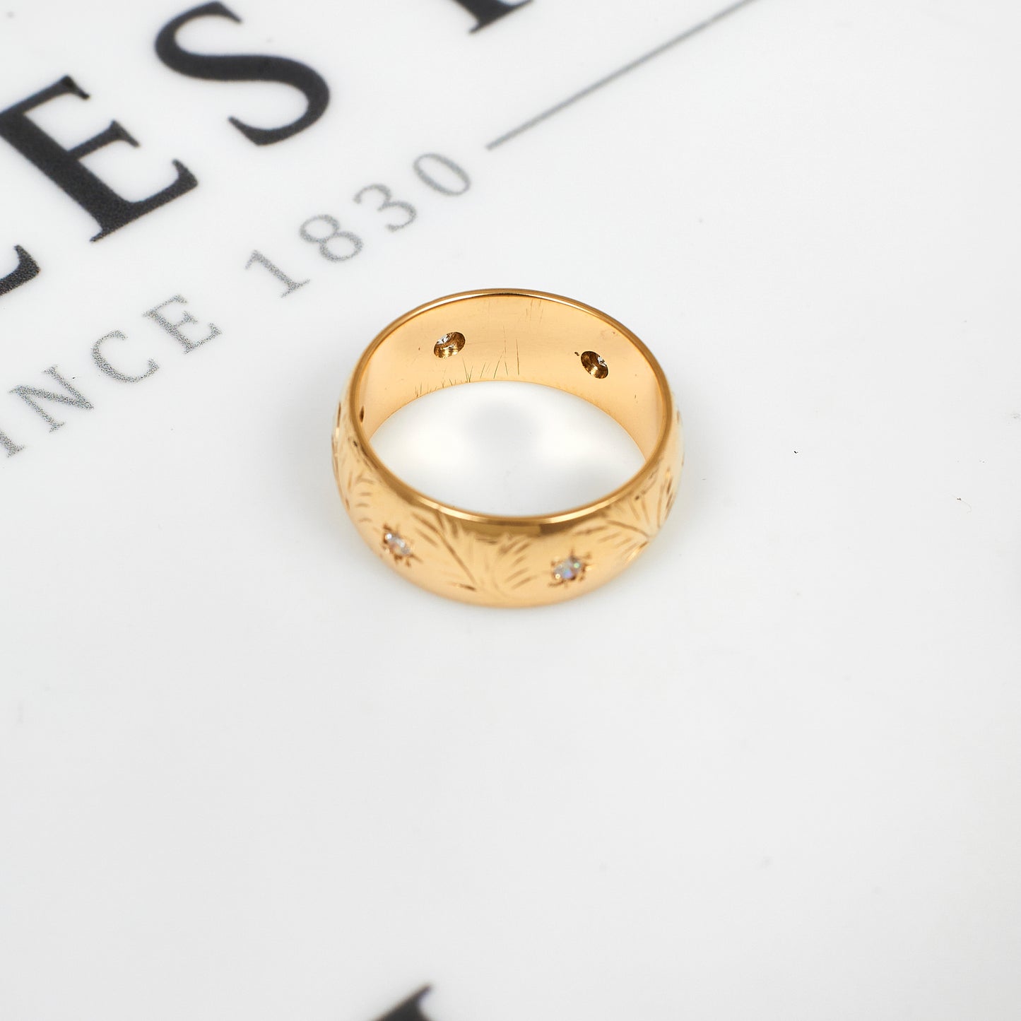 Pre-Owned 9ct Gold & 6 CZ Band Ring Size M.5