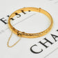 Pre-Owned 9ct Gold Patterned Hinged Bangle & Safety Chain
