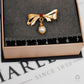 Pre-Owned 18ct Gold Bow Brooch & Cultured Pearl Drop