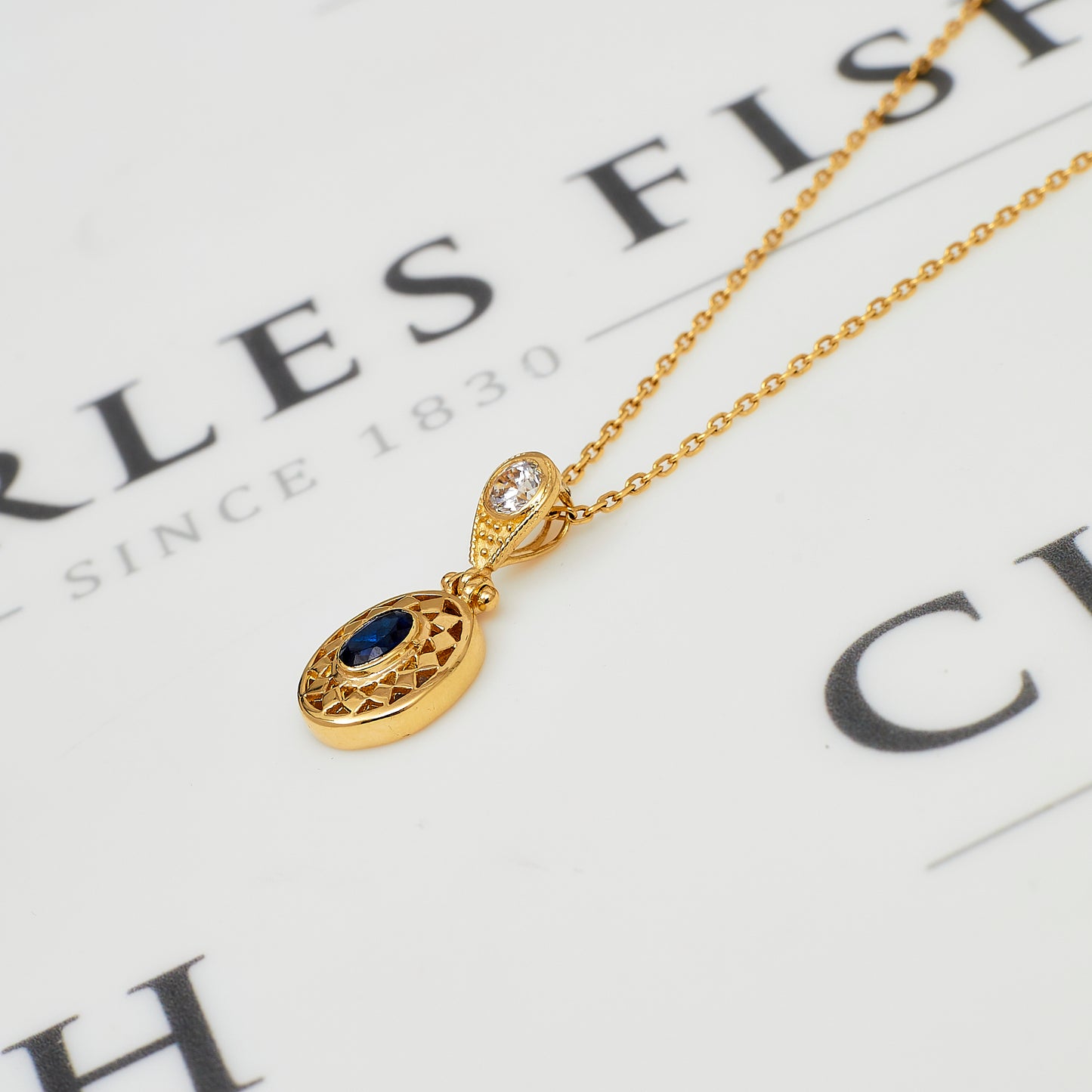 Pre-Owned 14ct Gold Oval Blue & White CZ Set Pendant