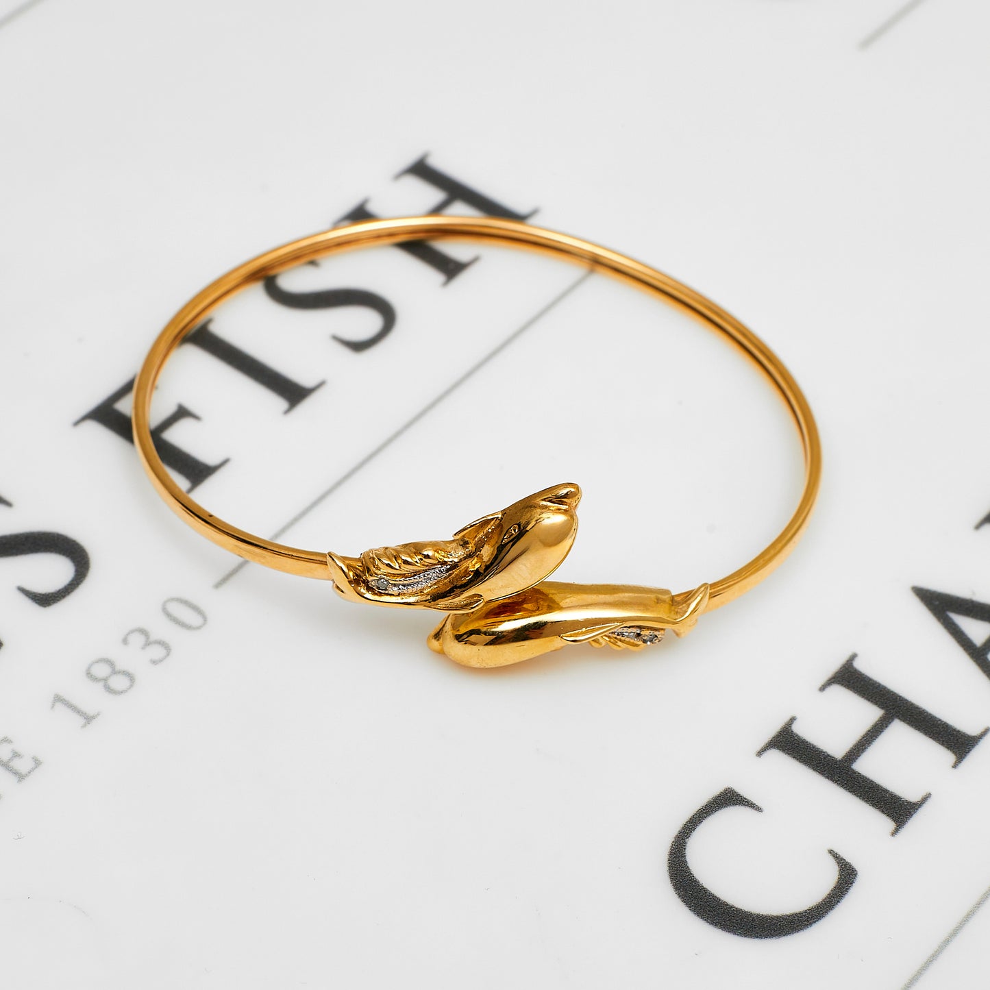 Pre-Owned 9ct Gold Crossover Dolphin Bangle