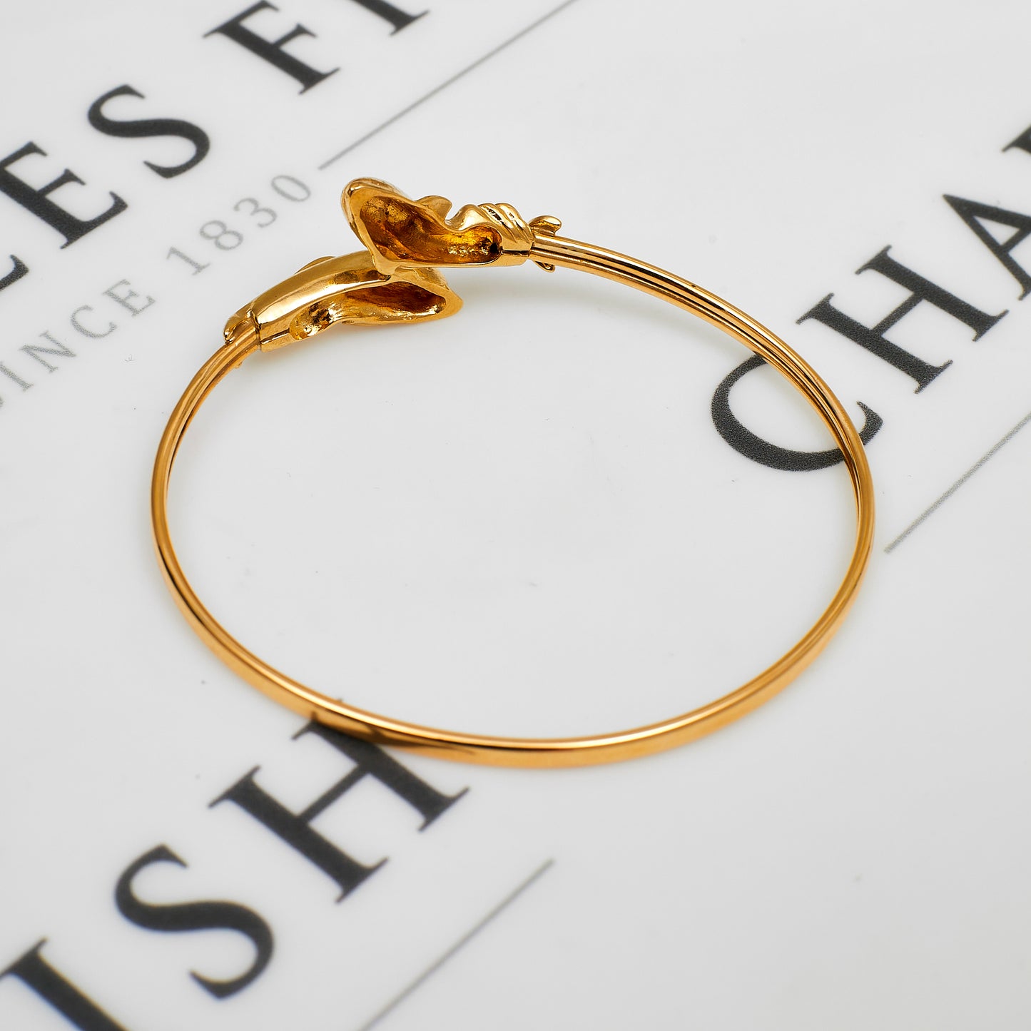 Pre-Owned 9ct Gold Crossover Dolphin Bangle