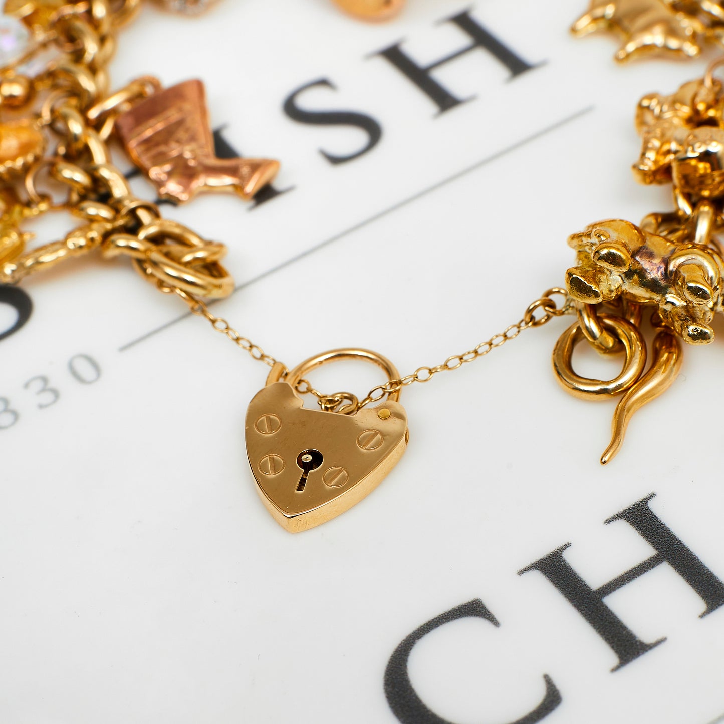 Pre-Owned 9ct Gold Charm Bracelet & 36 Charms 8 Inch