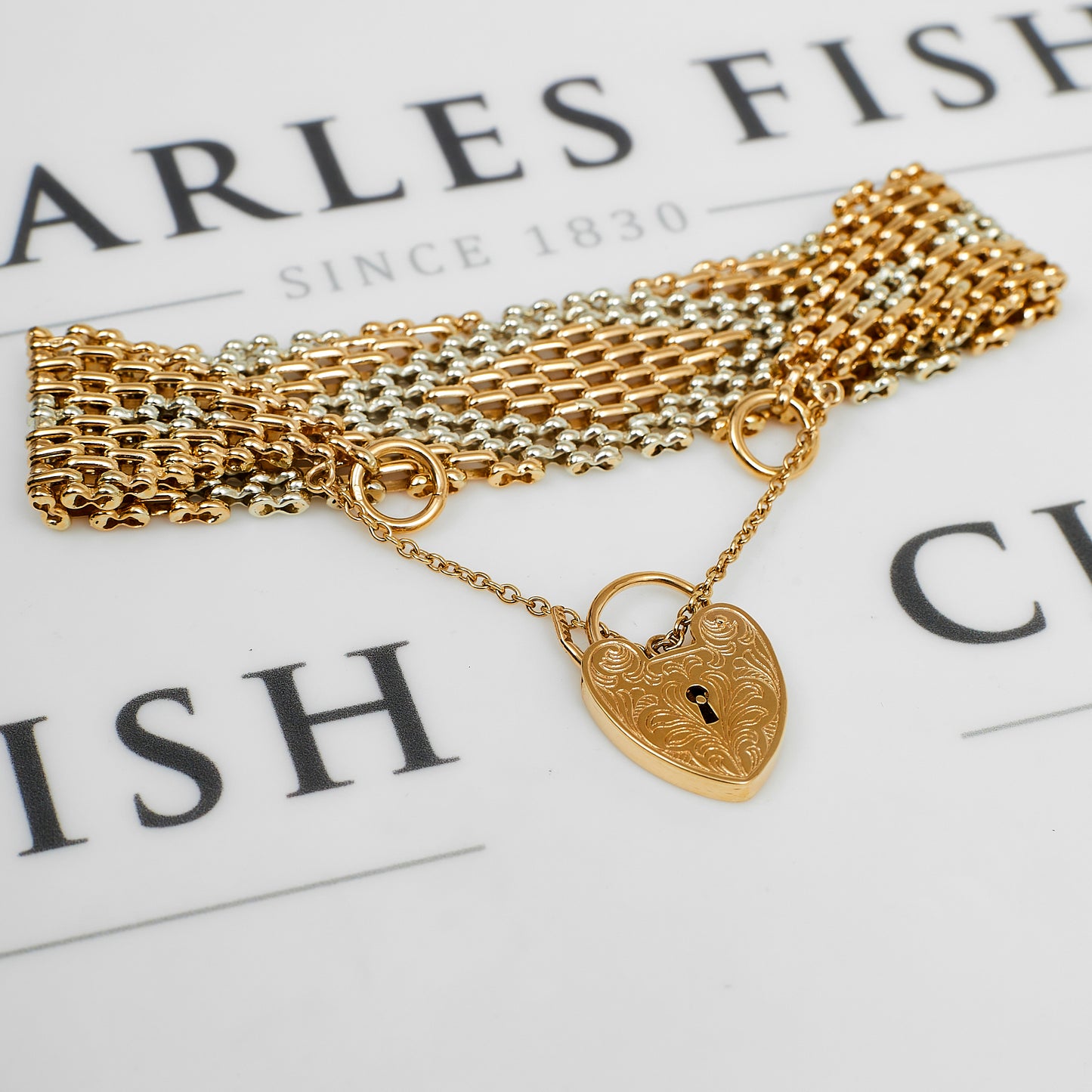 Pre-Owned 9ct Gold 2 Tone 8 Bar Gate Bracelet