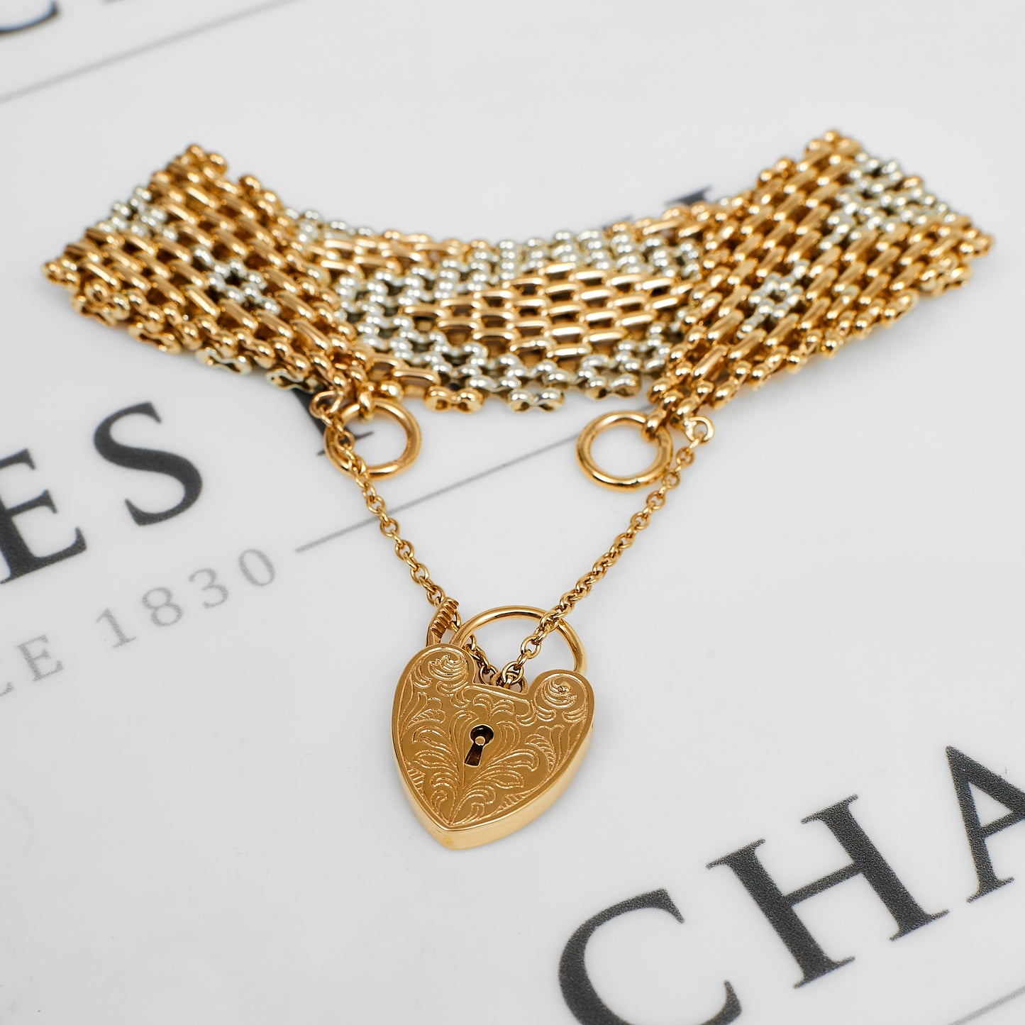 Pre-Owned 9ct Gold 2 Tone 8 Bar Gate Bracelet