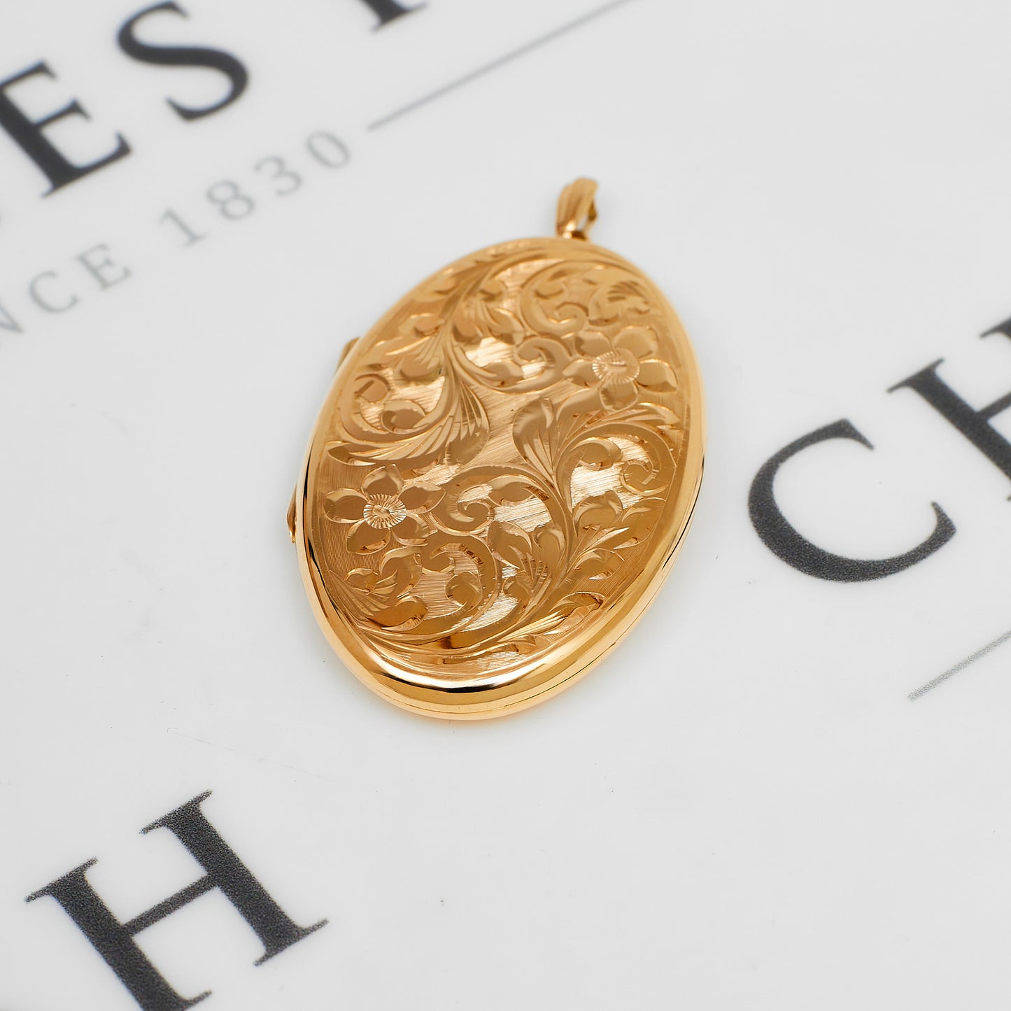 Pre-Owned 9ct Gold Oval Flower Swirl Locket Pendant