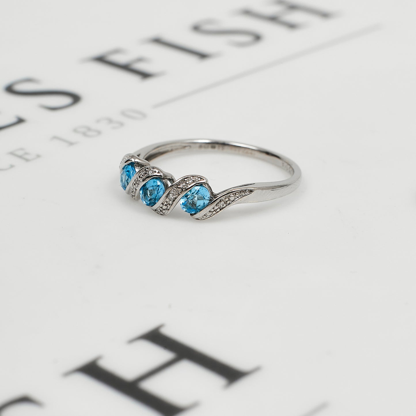 Pre-Owned 9ct White Gold Diamond & Blue Topaz Twist Ring
