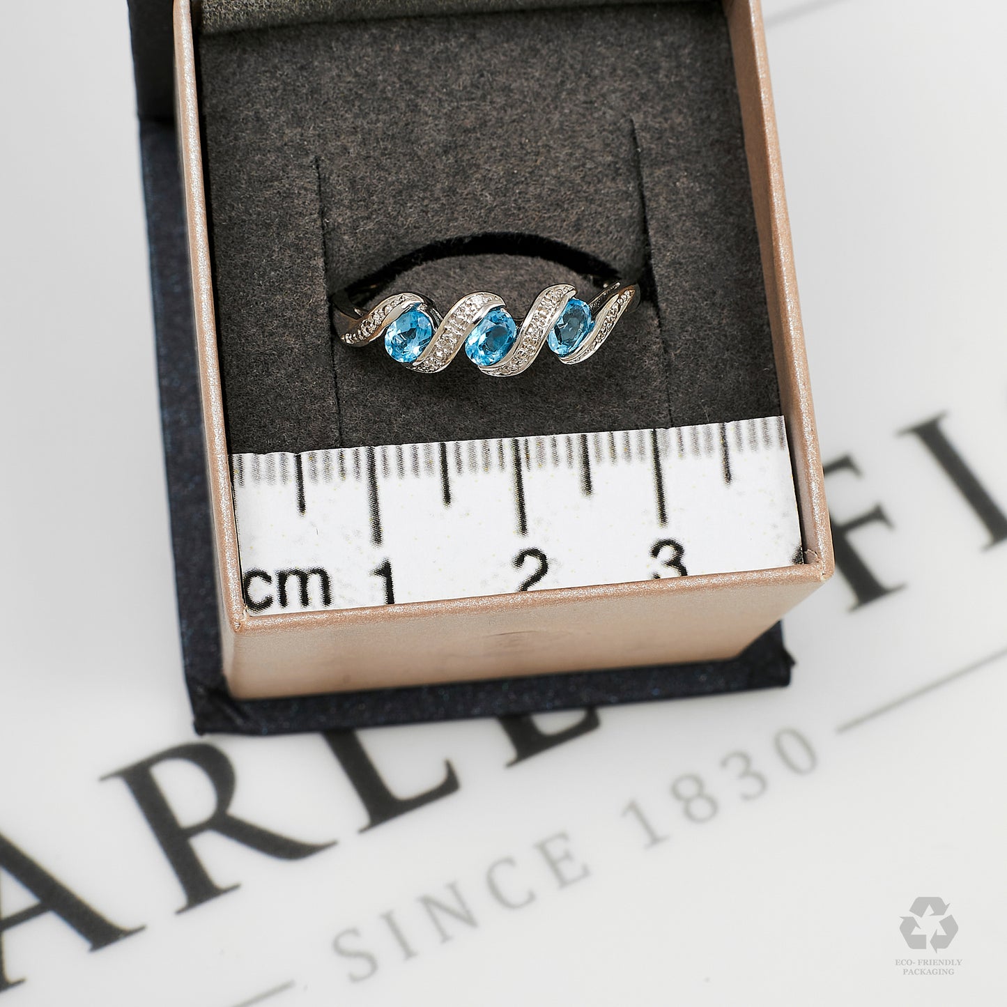 Pre-Owned 9ct White Gold Diamond & Blue Topaz Twist Ring