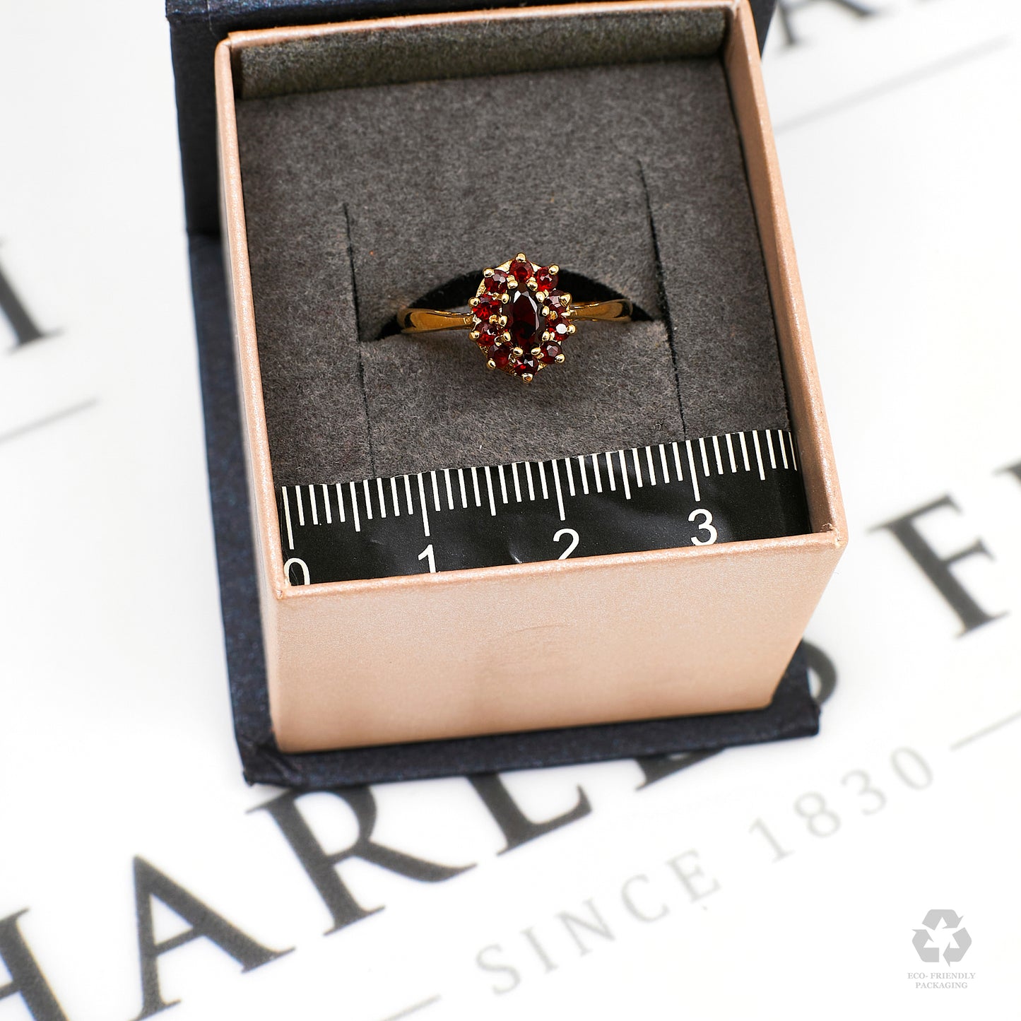 Pre-Owned 9ct Gold Oval Garnet Cluster Ring Size J.5