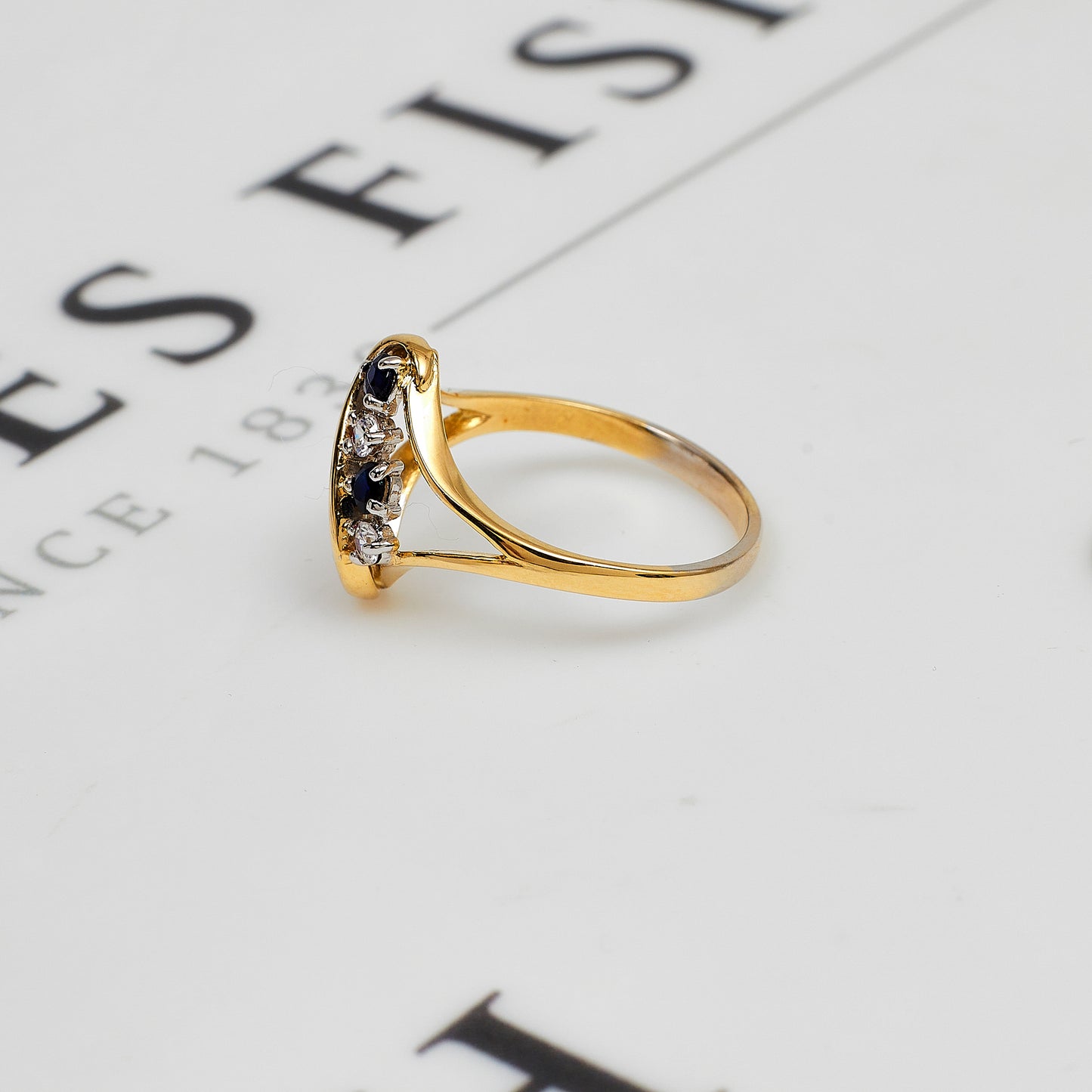 Pre-Owned 9ct Gold Sapphire & CZ Swirl Ring Size O.5