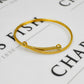 Pre-Owned 9ct Gold Guilloche Pattern Crossover Bangle