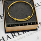 Pre-Owned 9ct Gold Guilloche Pattern Crossover Bangle