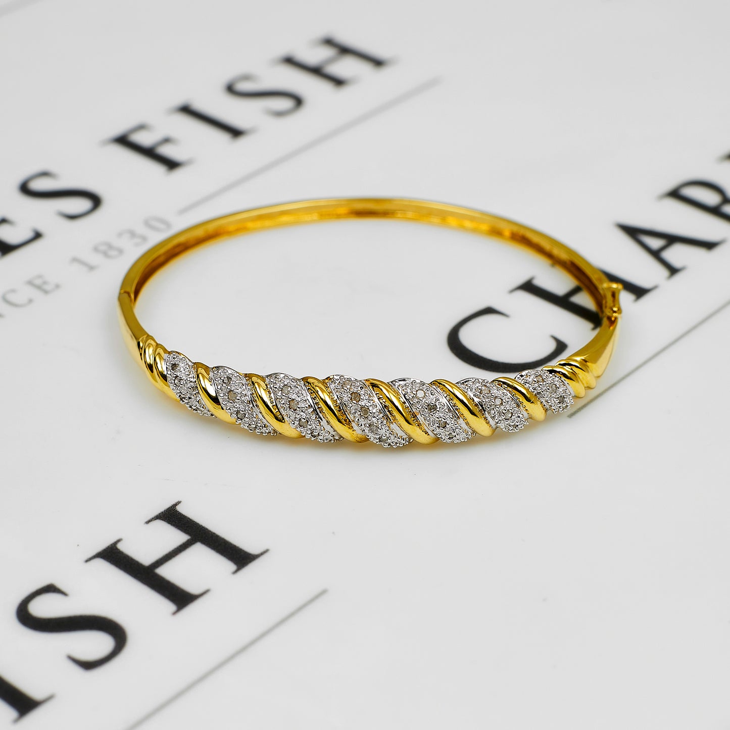Pre-Owned 9ct Gold & Diamond Twist Hinged Bangle