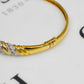 Pre-Owned 9ct Gold & Diamond Twist Hinged Bangle