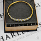 Pre-Owned 9ct Gold & Diamond Twist Hinged Bangle