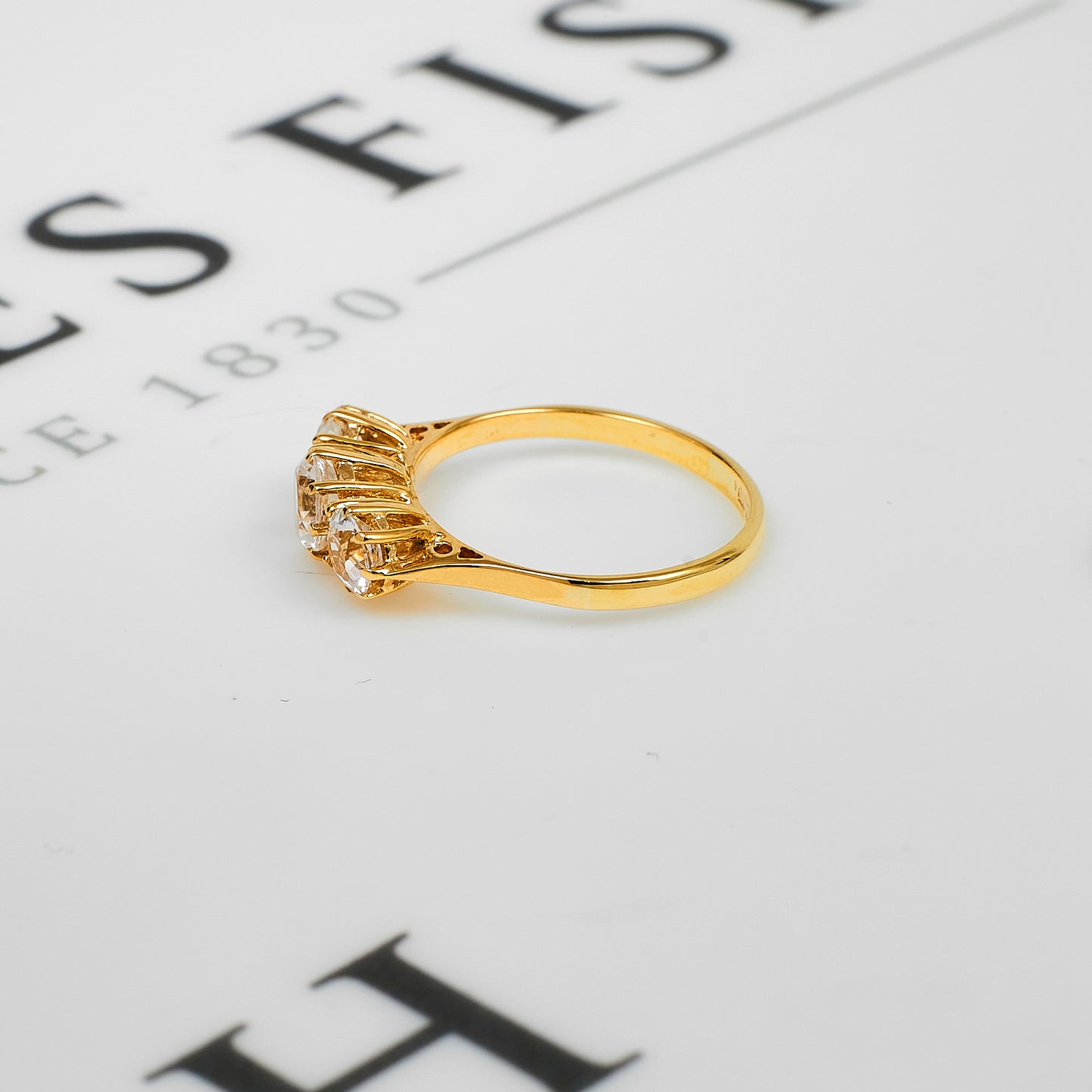 Pre-Owned 9ct Gold CZ Trilogy Ring Size K.5