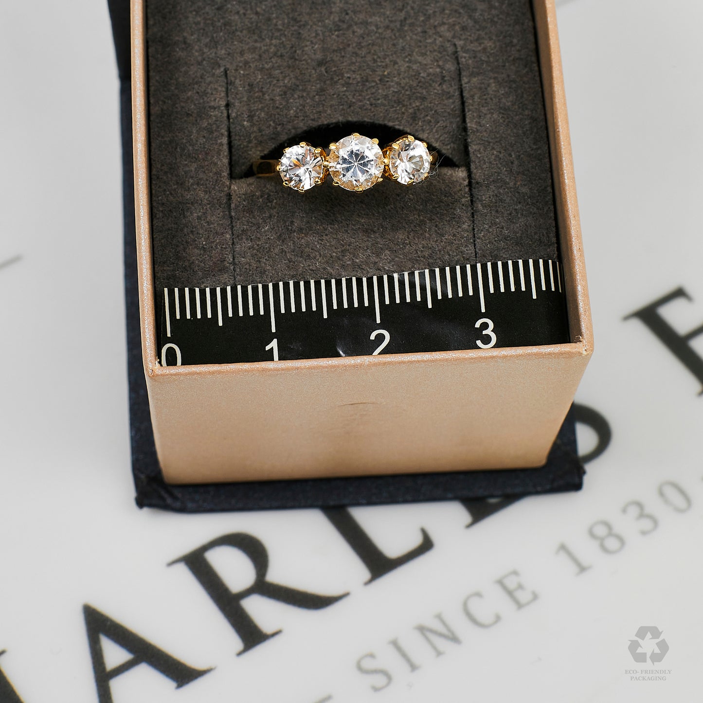 Pre-Owned 9ct Gold CZ Trilogy Ring Size K.5