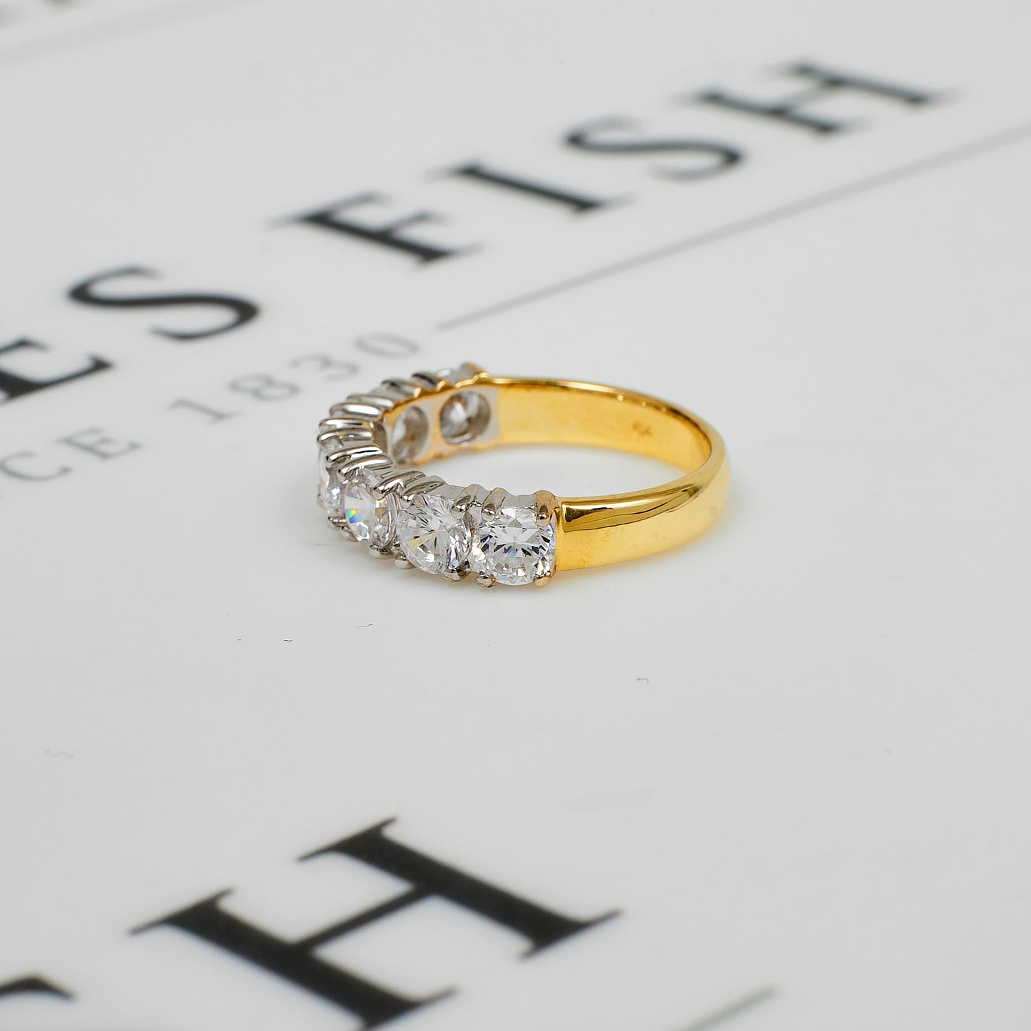 Pre-Owned 9ct Gold 7 CZ Dress Ring Size L.5