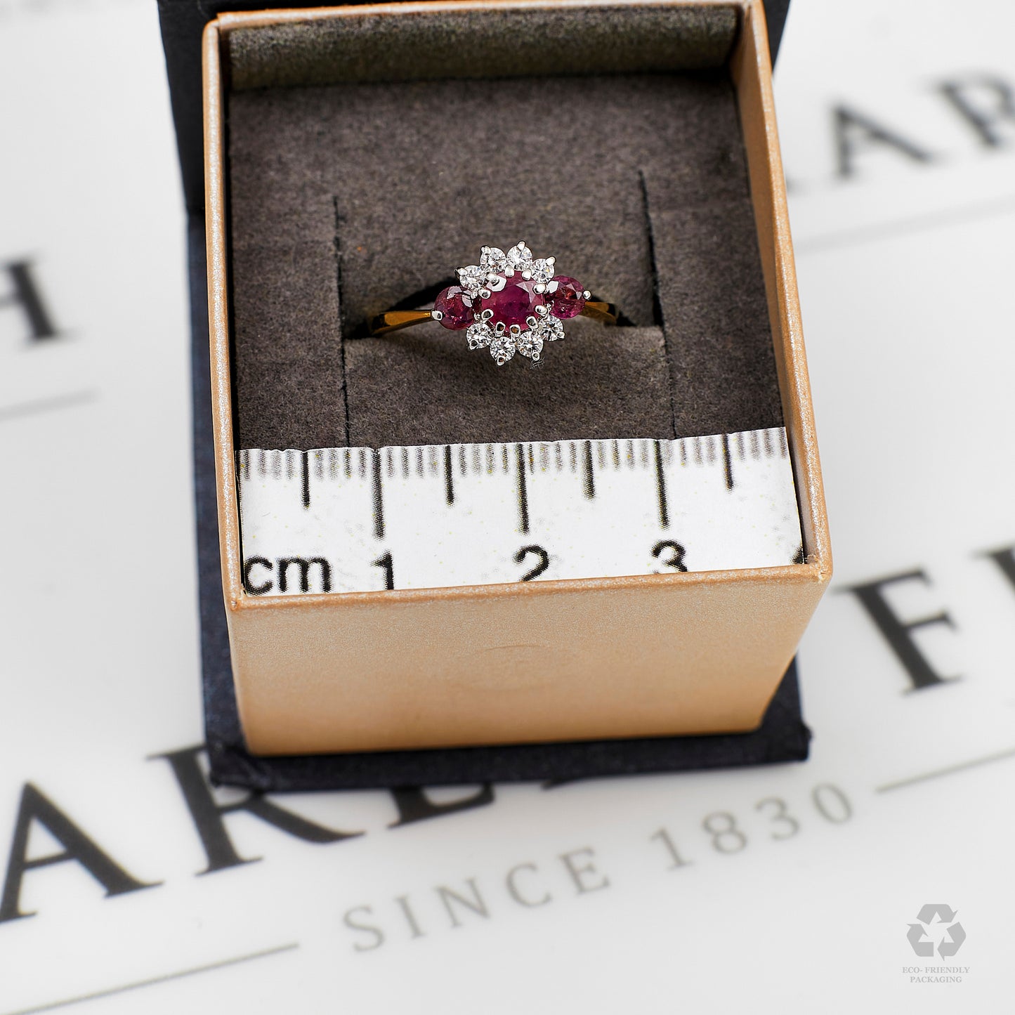 Pre-Owned 9ct Gold Ruby & CZ Dress Ring Size K.5