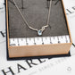 Pre-Owned 9ct White Gold Pear Cut Topaz & Diamond Necklace