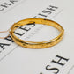 Pre-Owned 9ct Gold Swirl Design Hinged Bangle