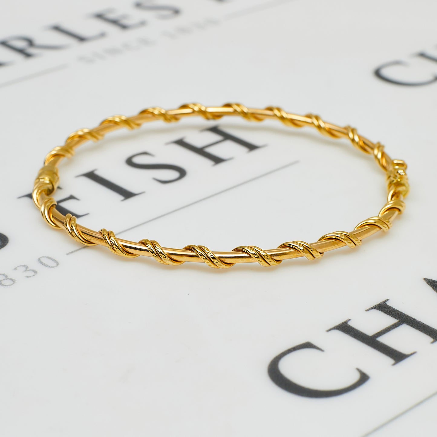 Pre-Owned 14ct Gold Twist Design Hinged Bangle