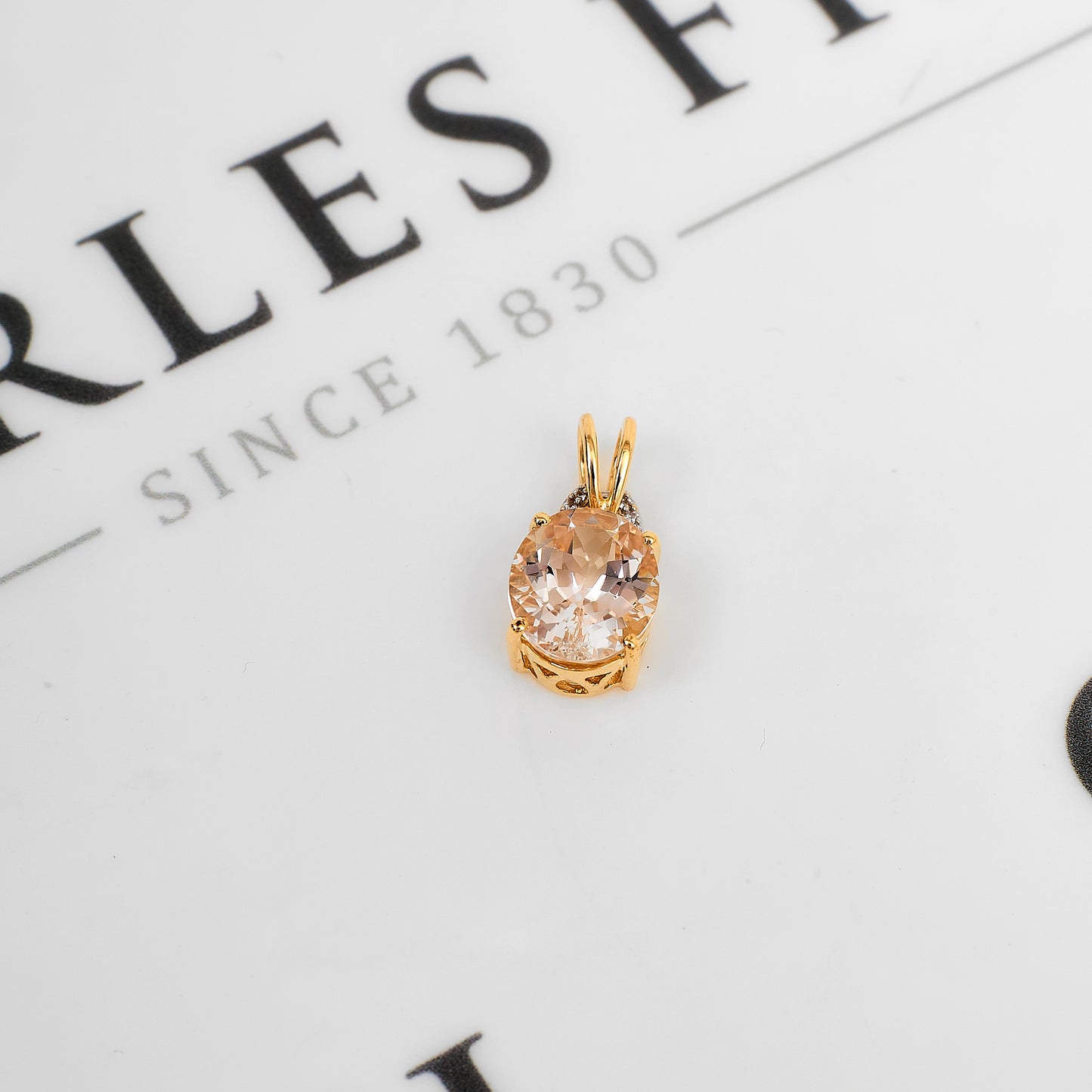 Pre-Owned 9ct Gold Oval Danburite & 6 White Zircon Pendant