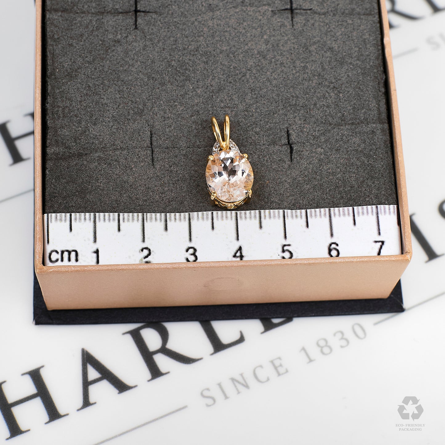 Pre-Owned 9ct Gold Oval Danburite & 6 White Zircon Pendant
