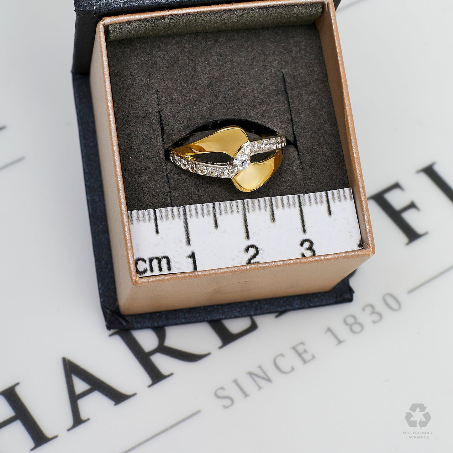 Pre-Owned 14ct Gold CZ Loop Design Ring Size O.5