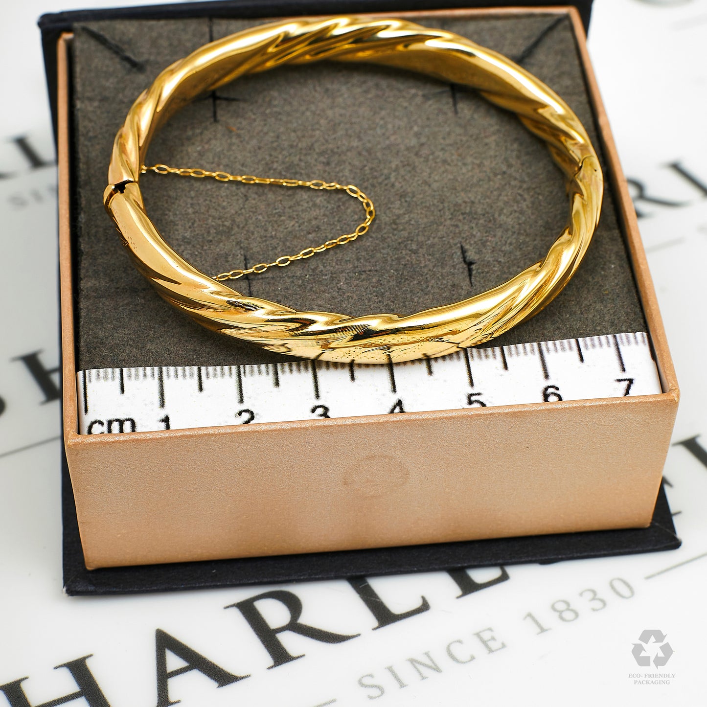 Pre-Owned 9ct Gold Hinged Twist  Bangle & Safety Chain