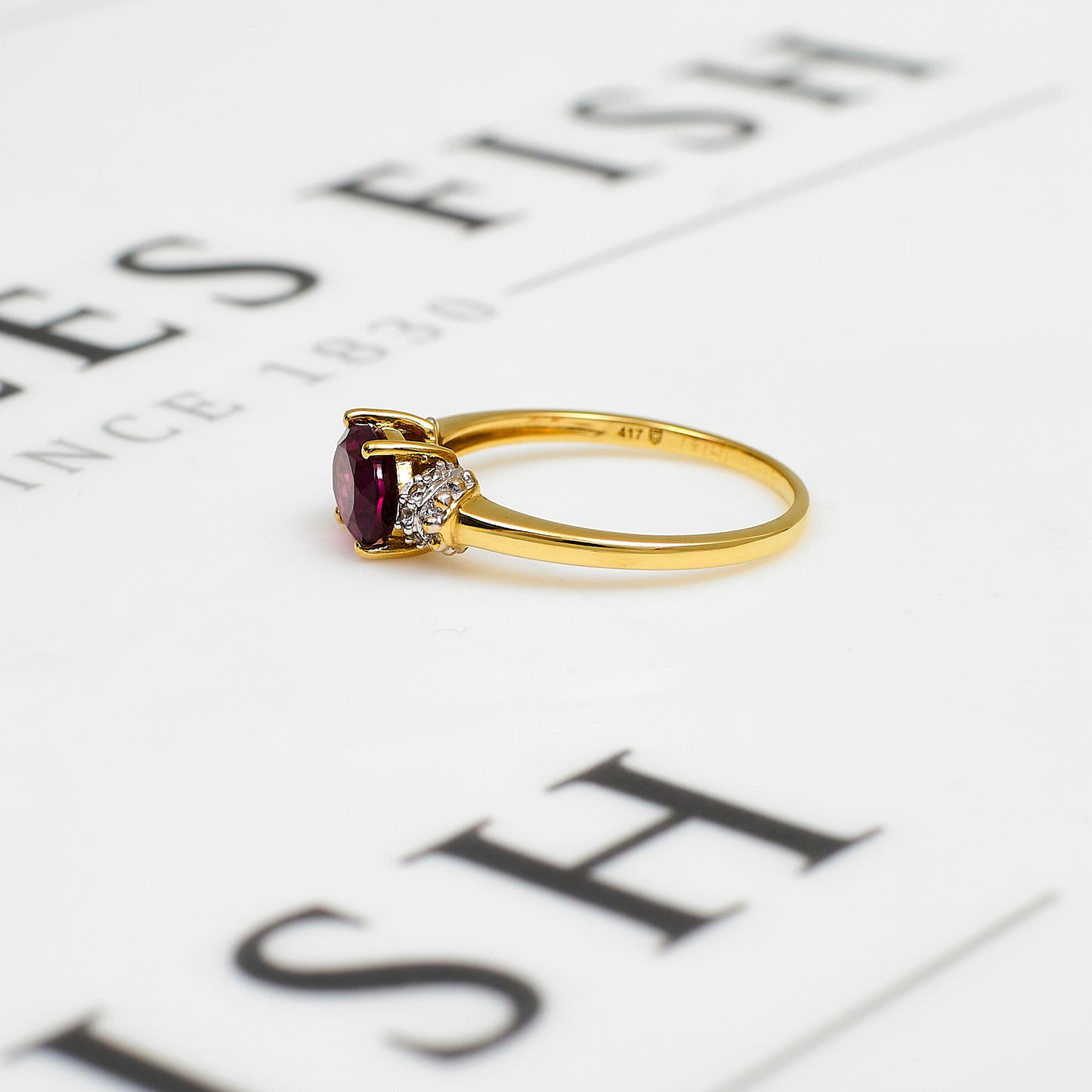 Pre-Owned 9ct Gold Oval Garnet & 10 White Zircon Ring Size N