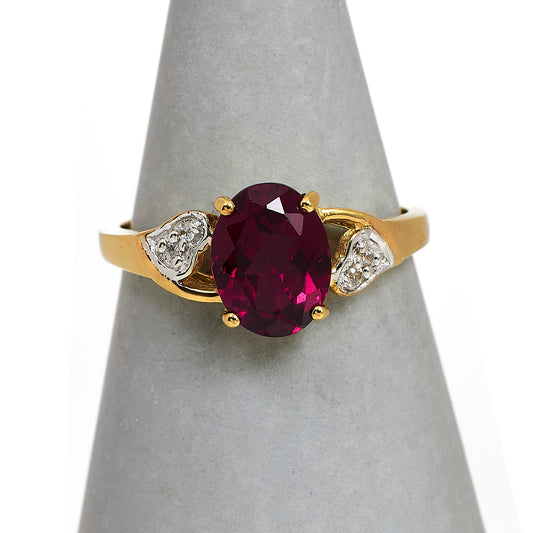 Pre-Owned 9ct Gold Oval Garnet & 4 White Zircon Ring Size N