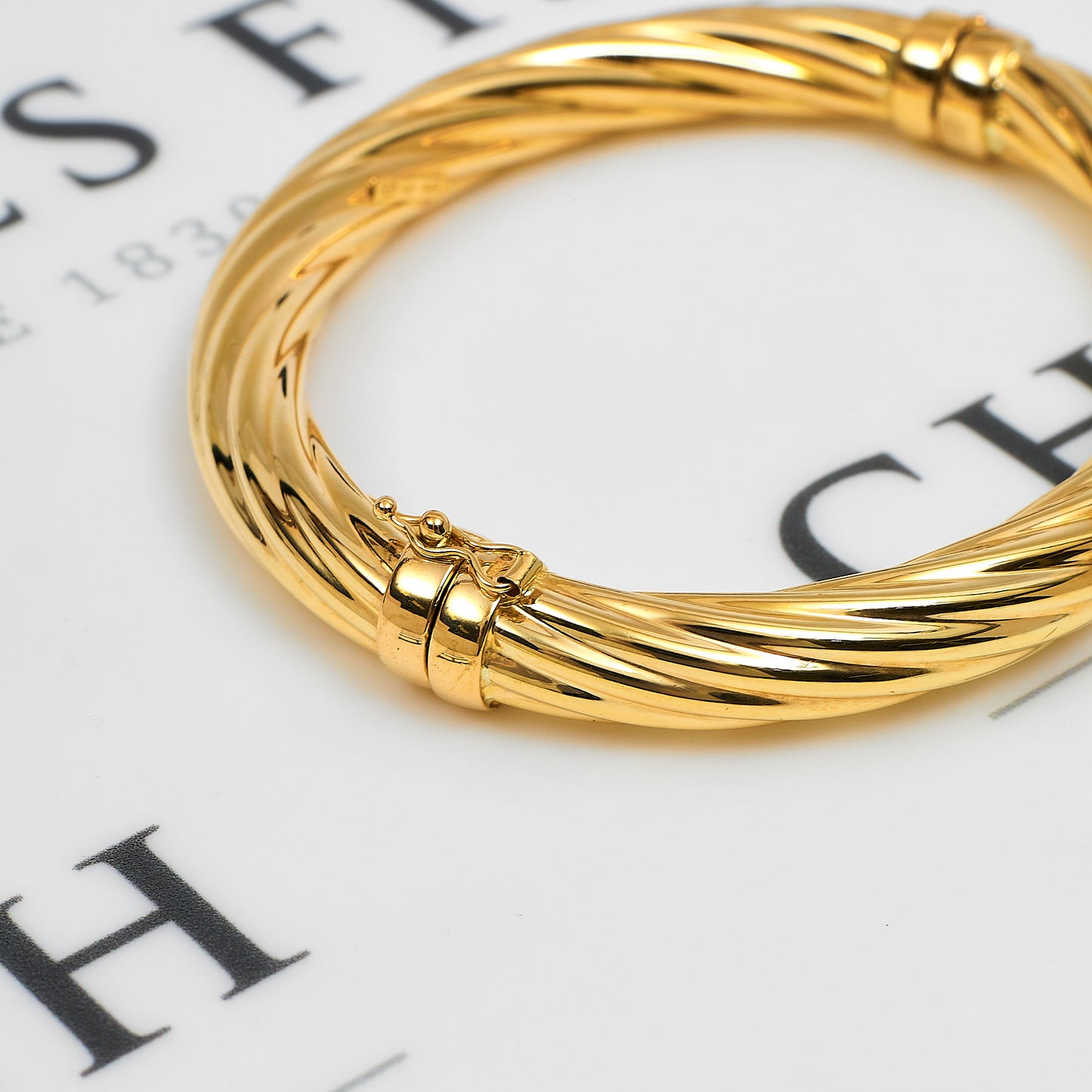 Pre-Owned 9ct Gold Hinged Twist Design Bangle