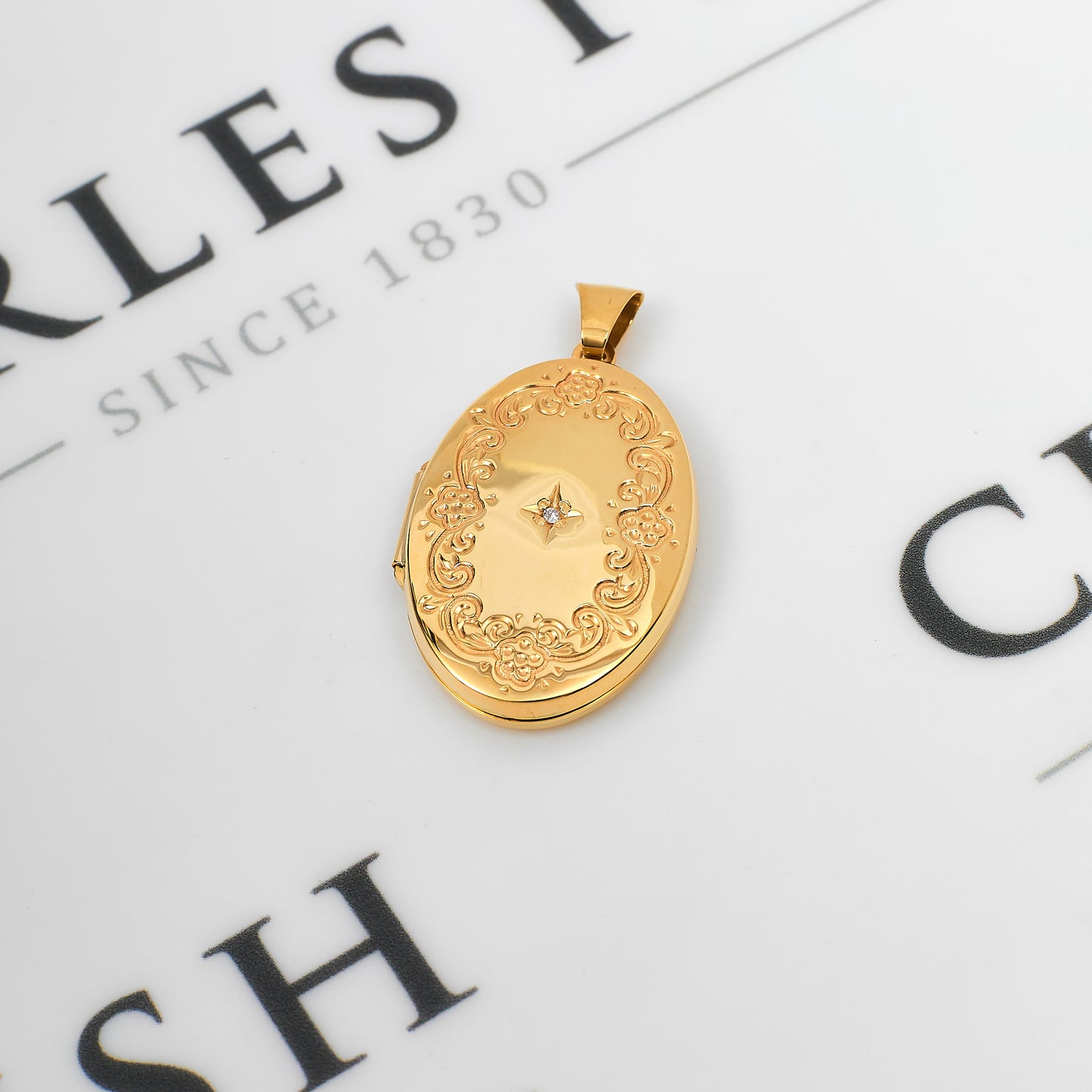 Pre-Owned 9ct Gold Single Diamond Oval Locket Pendant