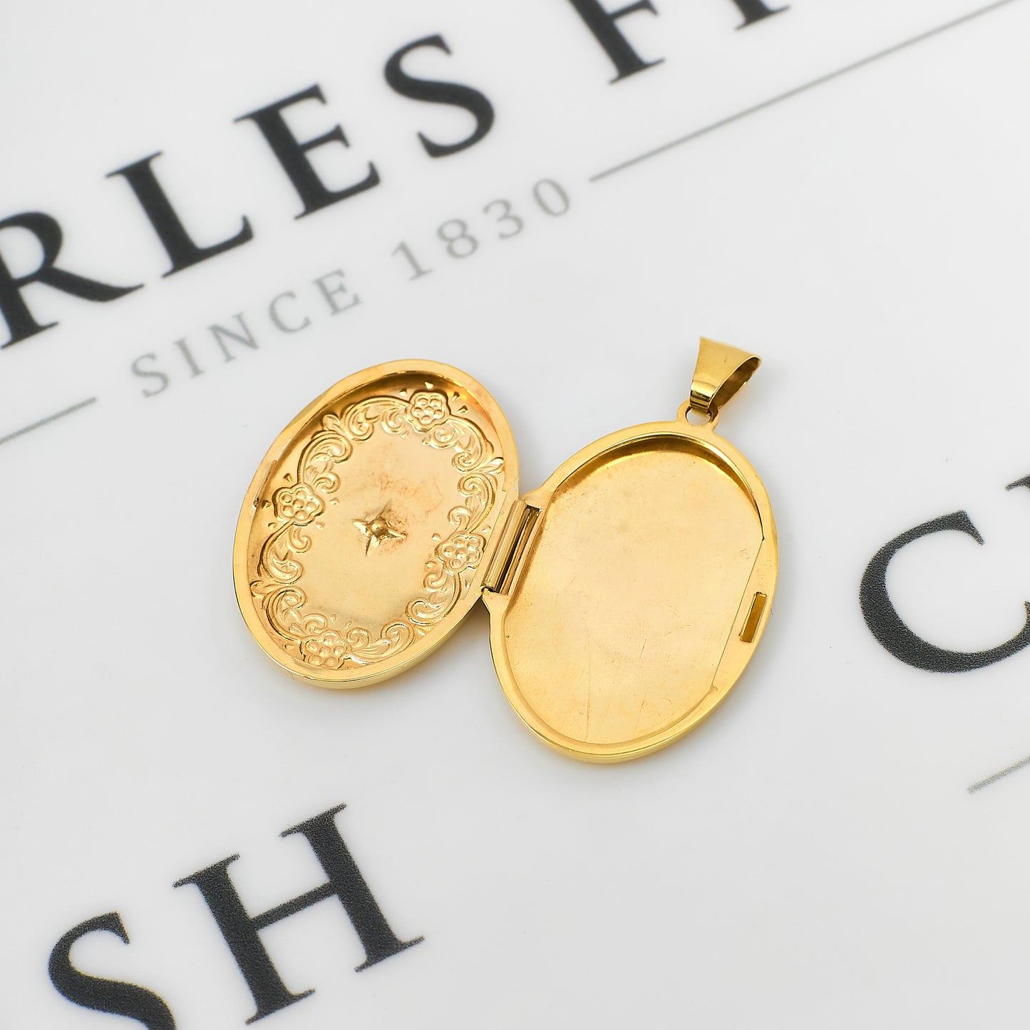 Pre-Owned 9ct Gold Single Diamond Oval Locket Pendant