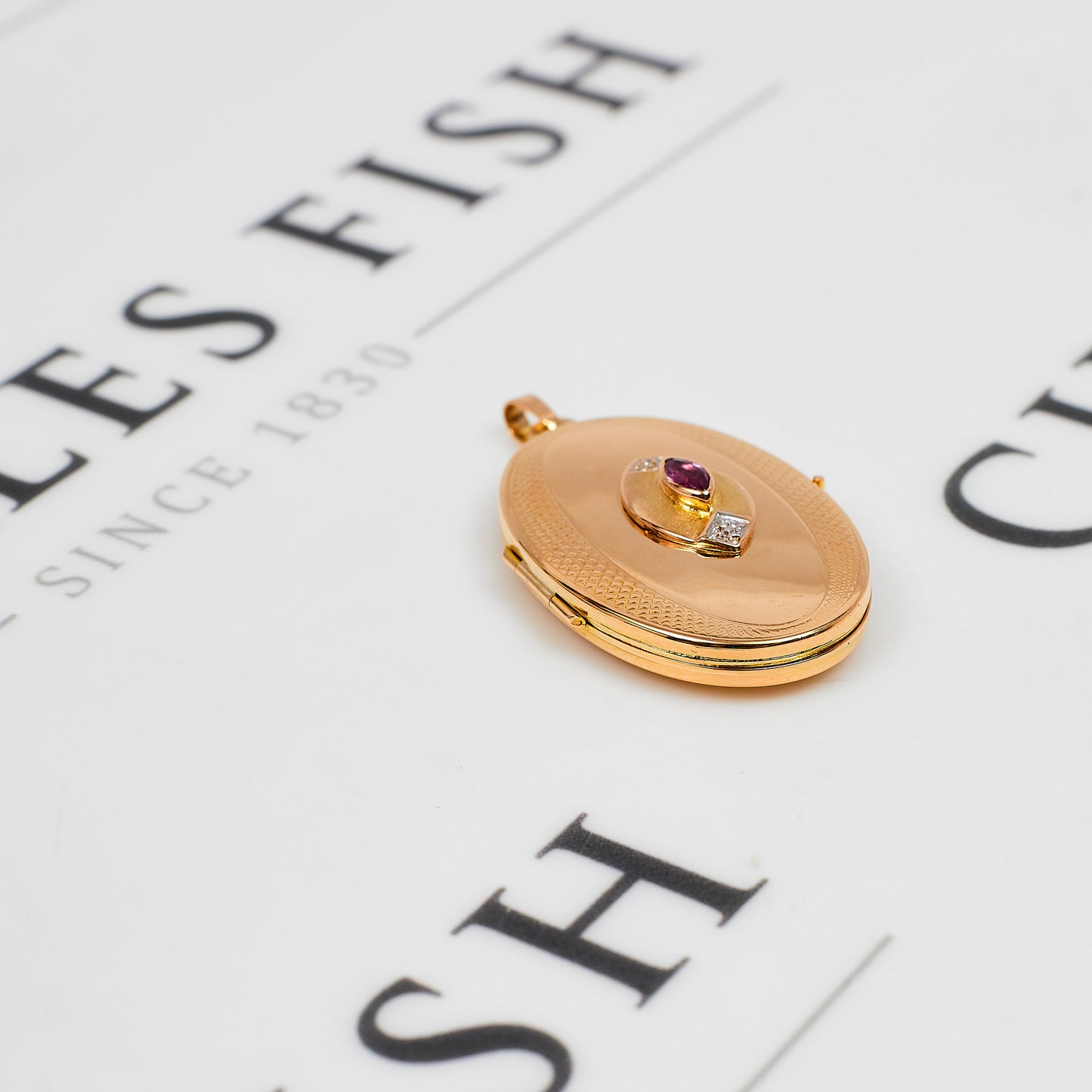 Pre-Owned 9ct Gold Ruby & Diamond Oval Locket